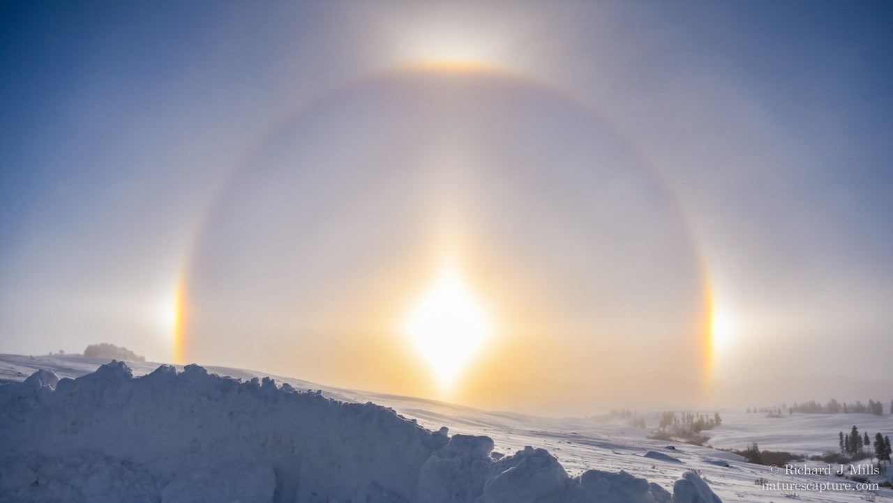 Thanks to Richard Mills, photographer and friend of WeatherWool, for this fabulous photo of a Sun Dog, taken in Yellowstone National Park when the temperature was -31F/-35C